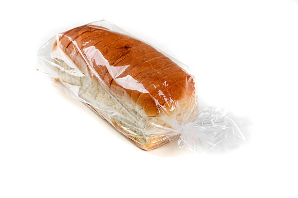 istock Loaf of whole grain bread in a bag 636964876