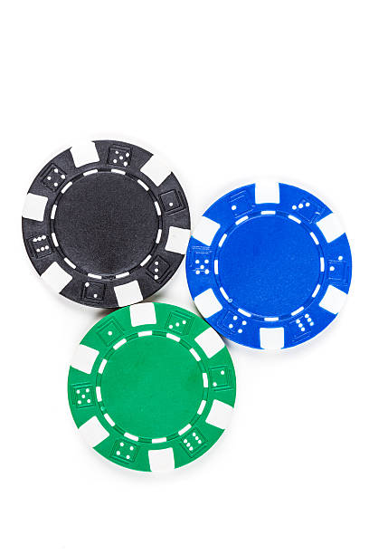 istock Black, green, and blue poker chips 636965048