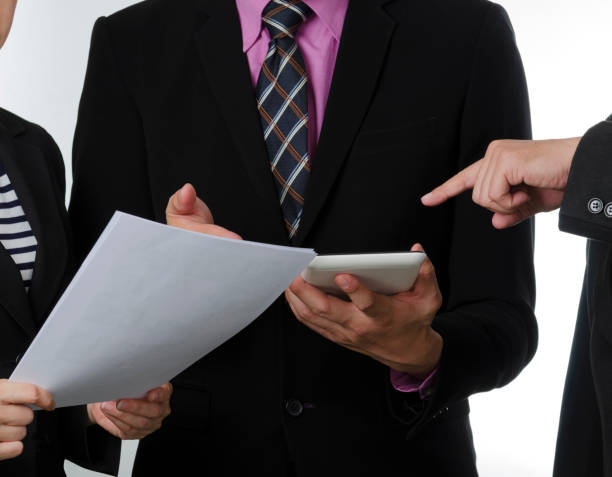 istock Businessman using touchpad in the meeting. 636971388