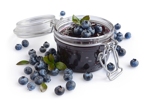 Homemade blueberry jam isolated on a white background