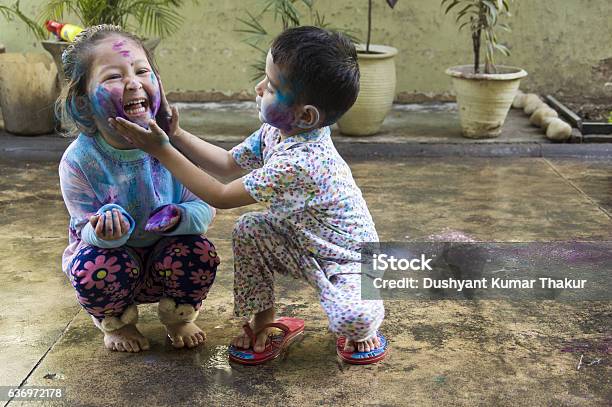 Kids Celebrating Holi Festival Of Colors Stock Photo - Download Image Now - Child, Toddler, Playing