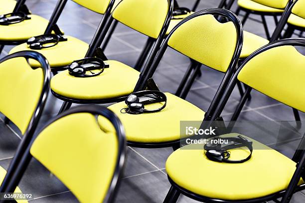 Translation Headphones On Chair Stock Photo - Download Image Now - Audio Equipment, Black Color, Close-up