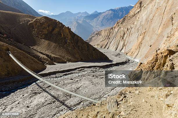 Suspension Bridge Across Mountain River Himalayas Nepal Stock Photo - Download Image Now