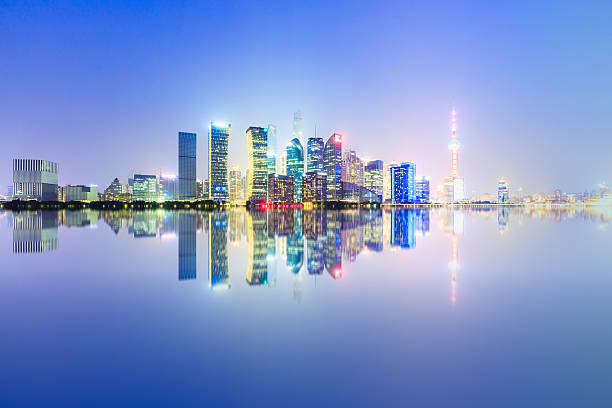 istock Shanghai skyline and modern cityscape at night 636977256