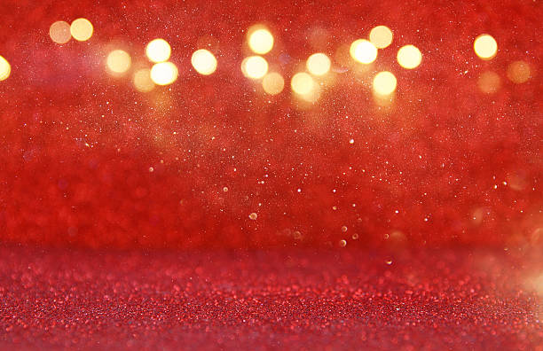 istock Red glitter vintage lights background 636981266