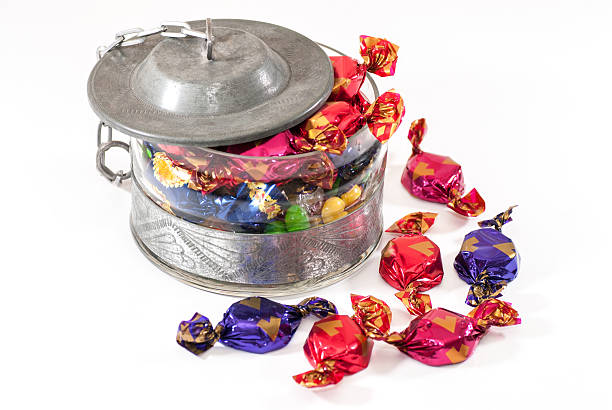 istock assorted bonbons in fancy sweet-box on white 636984304