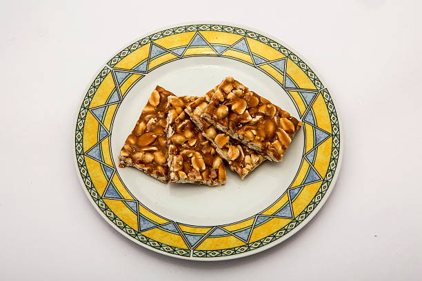 istock Groundnut Chikki with Jaggery or Peanut Chikki 636984586