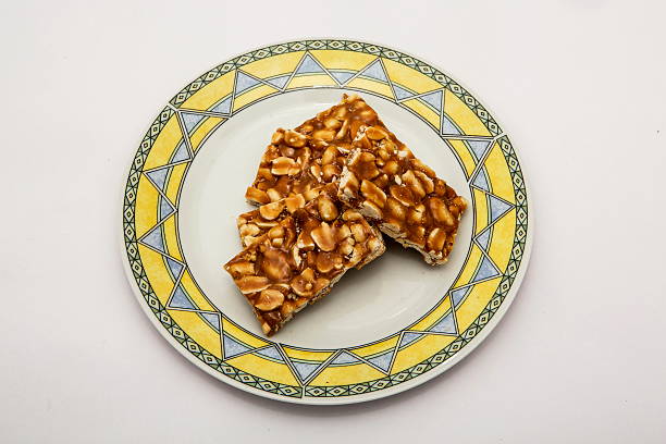 istock Groundnut Chikki with Jaggery or Peanut Chikki 636985536