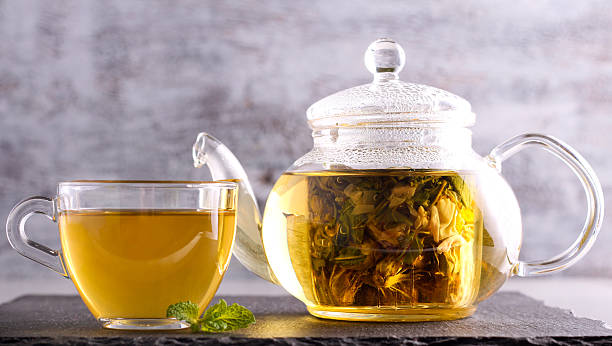 istock Herbal tea in a glass pot 636986740