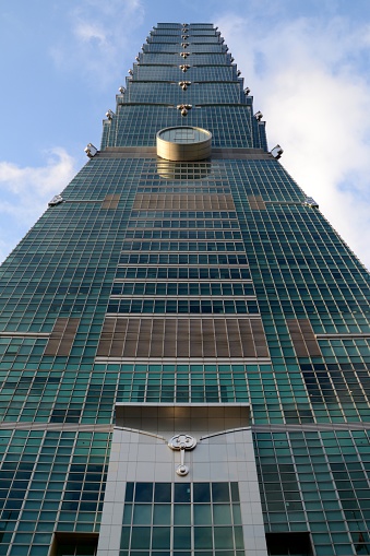 Taipei, Taiwan - September 23, 2016: Low angle view of Taipei 101 skyscraper, height 509 mt, a landmark supertall skyscraper in Xinyi District of Taipei, and one of the tallest buildings in the world. 