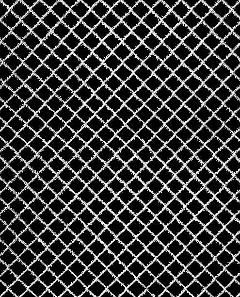 istock Metal net covered by crystals of ice hoarfrost isolated black 636988310