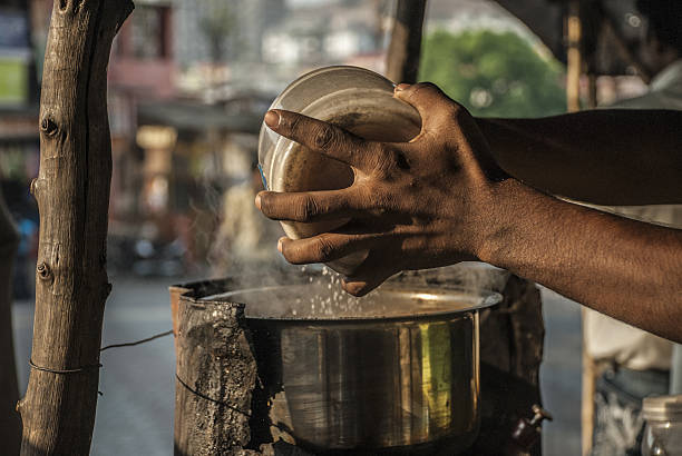 istock making tea in streets of mumbai 636988574