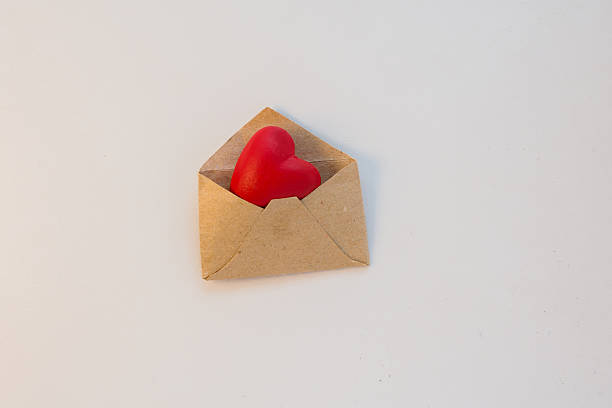 istock Red heart lies in the envelope 636998700