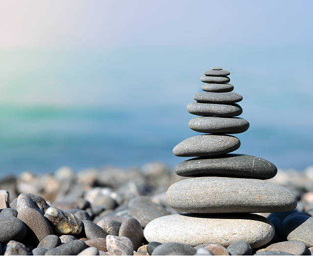 istock Stack of stones on the sea beach 637000096