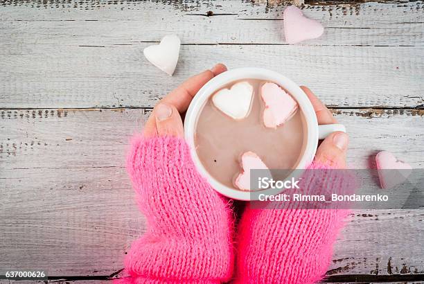 Girl Drinking Hot Chocolate With Marshmallowss Hearts Stock Photo - Download Image Now