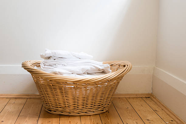 istock Laundry basket with white washing 637000758