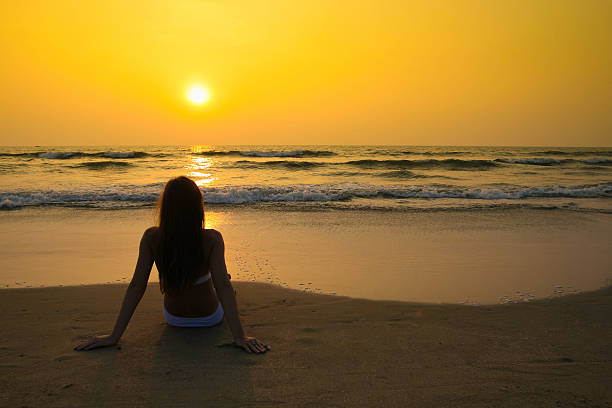 istock Woman on the beach 637001672