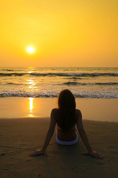 istock Woman on the beach 637001704