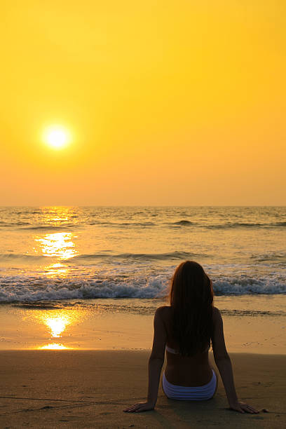 istock Woman on the beach 637001732