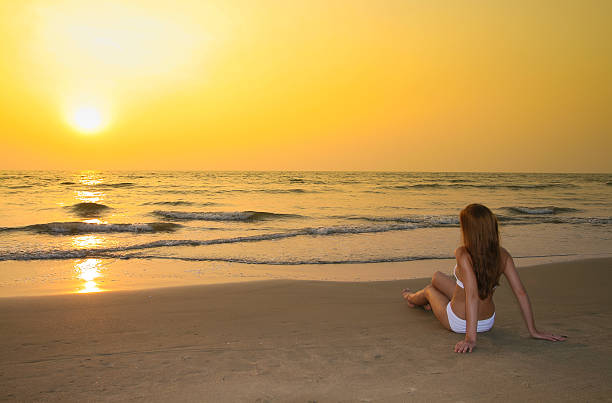 istock Woman on the beach 637001774