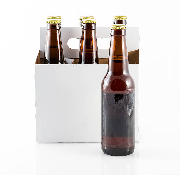 istock Five bottles of beer in cardboard carrier 637001972