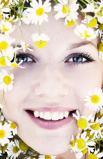 istock Woman and camomile 637002980
