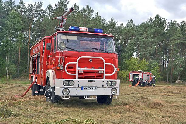 Oral, Kazakhstan - September 16, 2025: Monument to the Soviet classic truck ZiL-130 based fire apparatus ATs-40-63B in the city street.