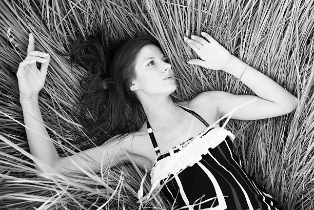 istock Lying woman on the grass 637003522