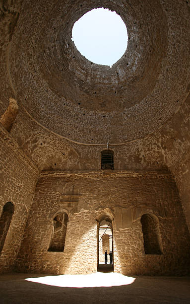 istock Interior view of Ardeshir Palace with two people in silhouette 637004396