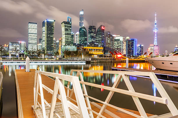 istock Modern urban architectural landscape at night in Shanghai 637008924