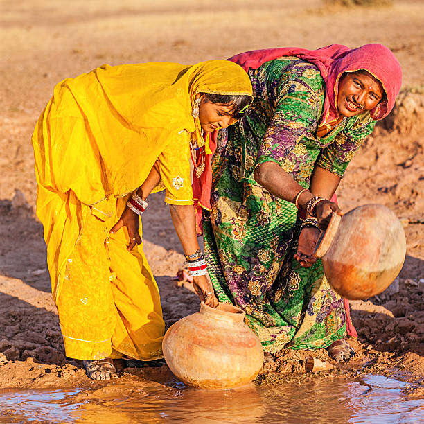 istock Indian women collecting water, Rajasthan 637009166