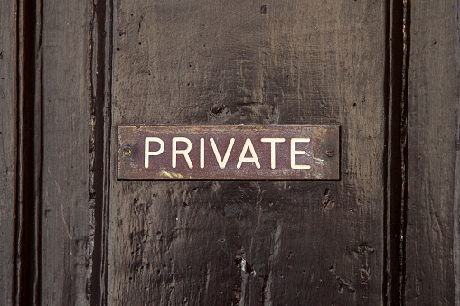 A Private Sign on a doorway.