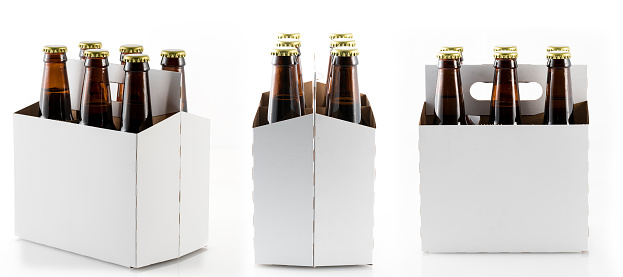 Stock photograph of beer Bottles gathered in a box for recycling