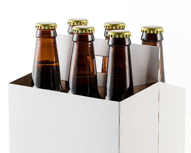 istock Six bottles of beer in cardboard carrier 637012304