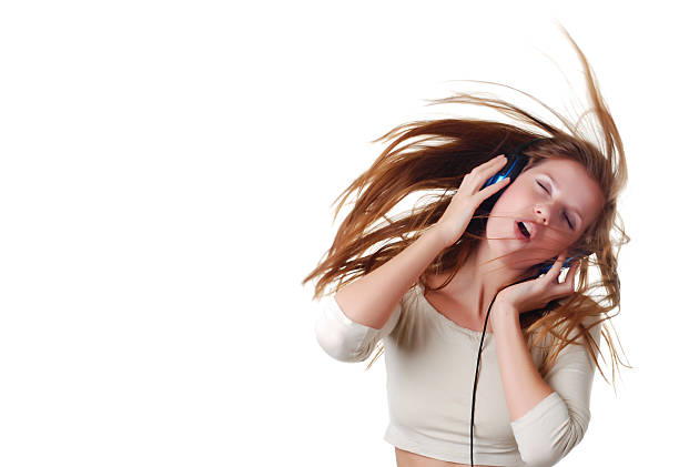 istock woman with headpfones 637012768