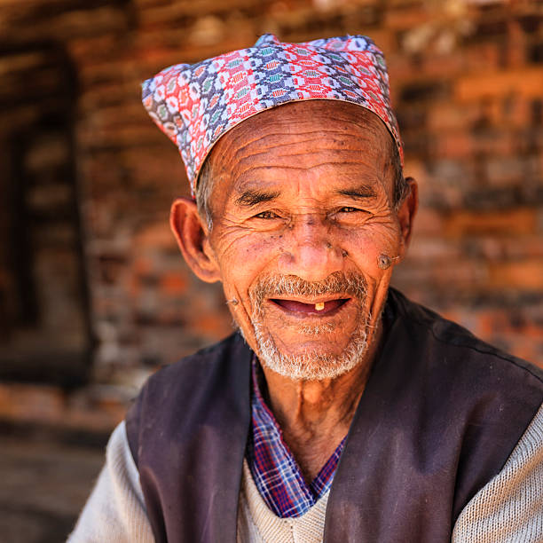 istock Old Nepali man resting in Bhaktapur 637014430