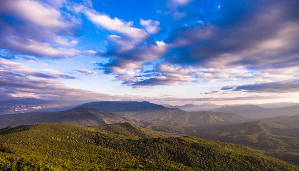 istock Aerial landscape. Mountain forest and cloudy sky. 637019488