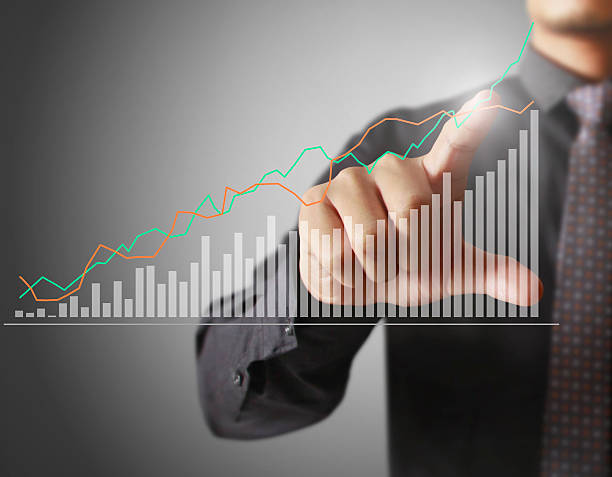 istock financial symbols coming from hand 637020750