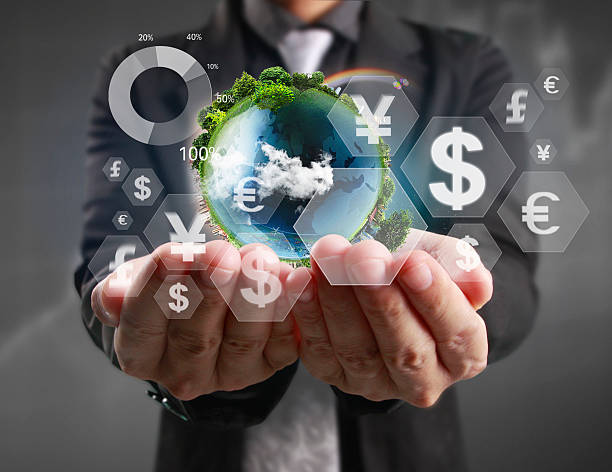 istock financial symbols coming from hand 637022320