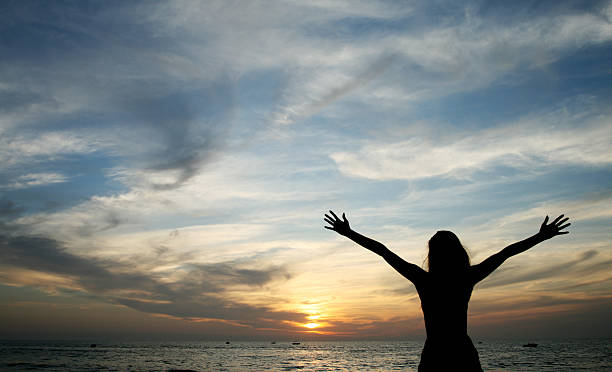 istock woman and sunset 637023460