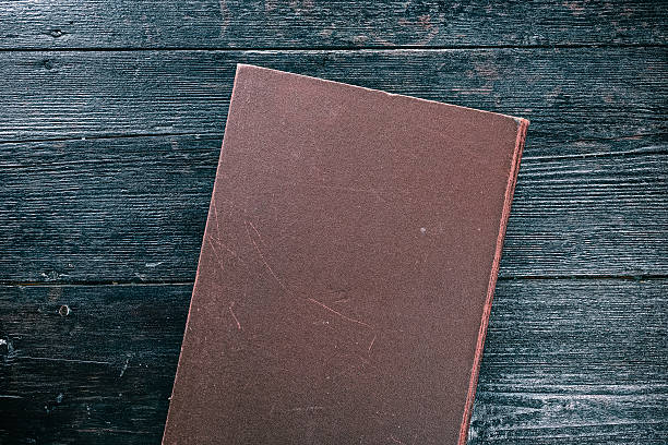 istock Map book on the dark wood 637023754