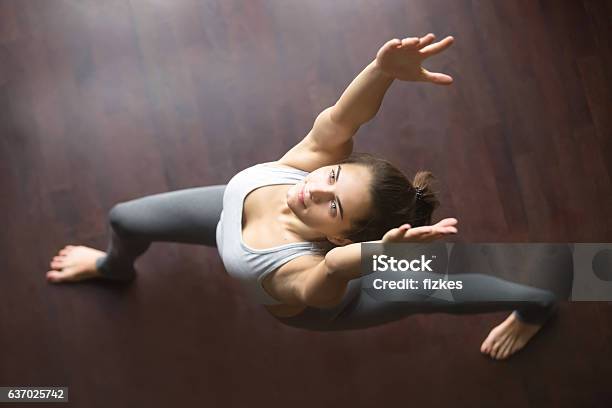 Top View Of Virabhadrasana 1 Yoga Pose Stock Photo - Download Image Now - Yoga, High Angle View, Women