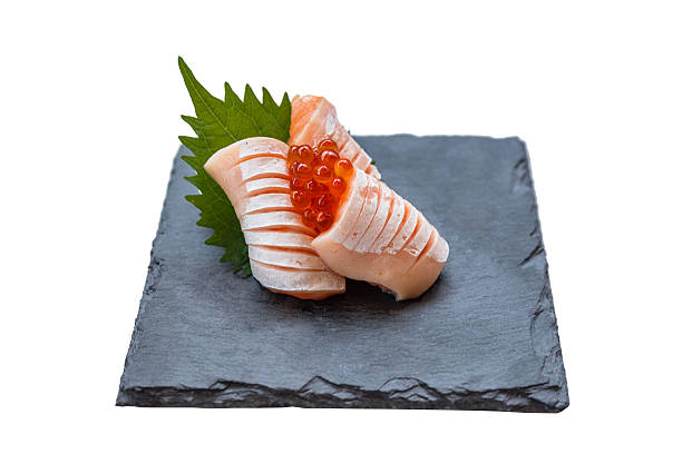 istock Isolated Medium Rare Salmon Sashimi in Stone Plate. 637026358