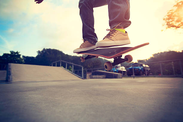 istock young skateboarder legs skateboarding at skatepark 637026942