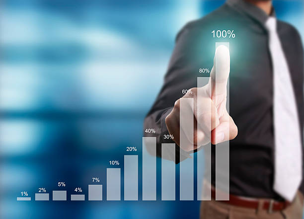 istock financial symbols coming from hand 637027278