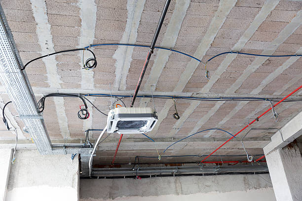 istock Air Conditioner in Office Space Being Remodeled 637032256