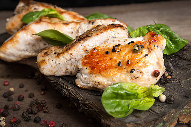 Grilled turkey fillet with appetizing roasted crust garnish spin