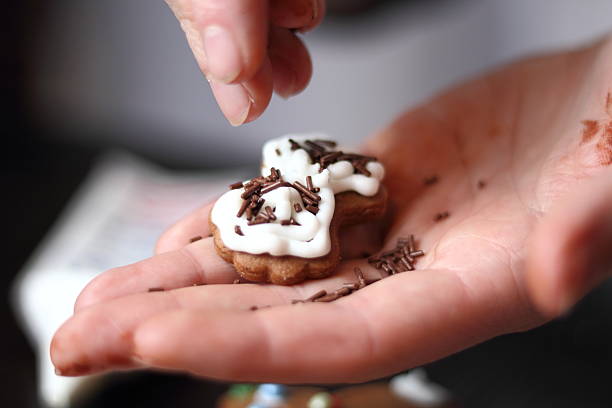 Sprinkle chocolate strands. Making Gingerbread Cookies Series.