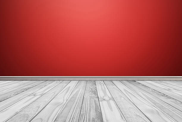 istock White wood floor panels with red wall. texture background 637037340