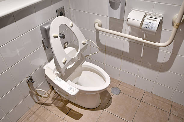 istock Warm water washing toilet seat 637041474
